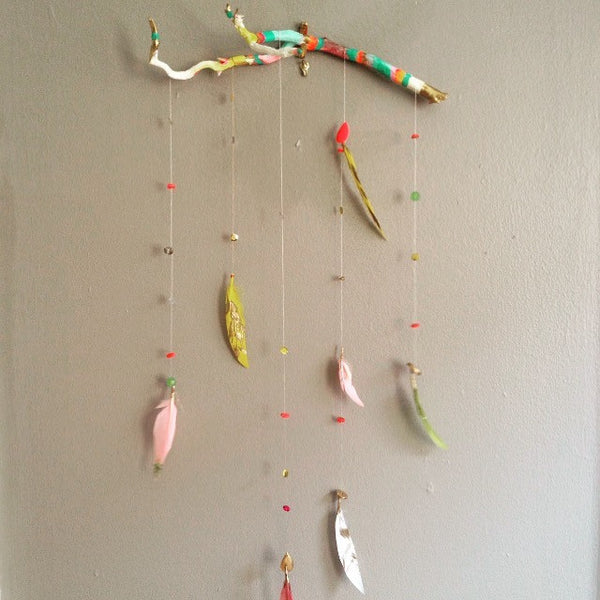 Drift wood and feather mobile