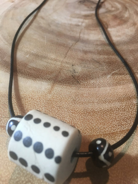 Adjustable choker with ceramic bead